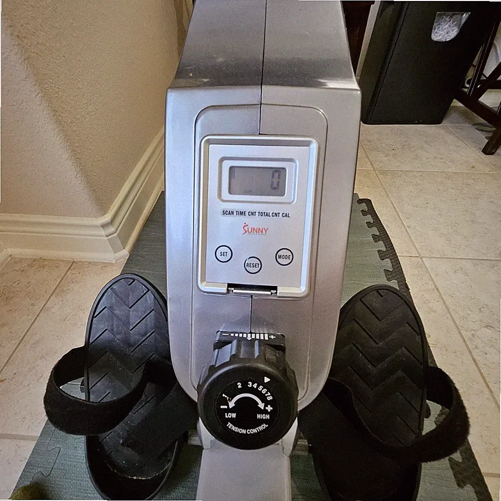 Gently used Sunny Health & Fitness rowing machine